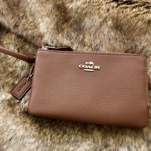 Coach Wristlet with gold colored detail